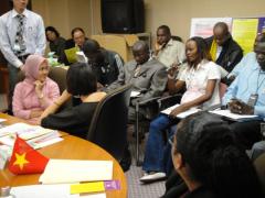 6. JICA participants listening to country report presentations